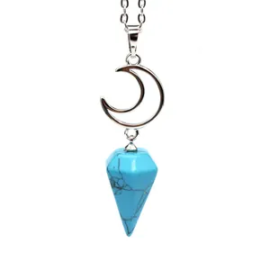 Detailed view of silver moon necklace featuring a blue hexagonal cone gemstone pendant