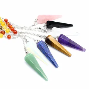 Detailed view of assorted natural stone hexagonal cone pendulums with silver chains