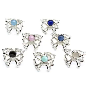 Unique silver spider open ring set featuring various natural gemstones like kyanite and kunzite