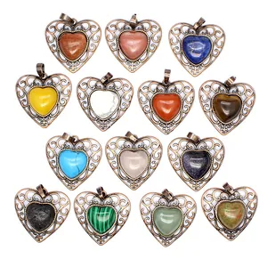 Variety of vintage style hollow heart pendants with natural crystals and semi-precious gemstones.