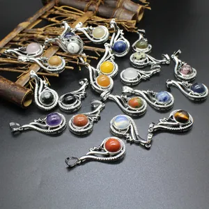 Variety of natural stone pendants featuring silver-tone wing frames for women
