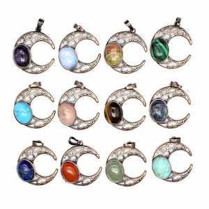 Collection of twelve vintage hollow moon pendants set with various natural stones