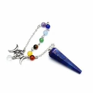 Close-up of seven chakra beads and triple moon pentagram charm on lapis lazuli pendulum