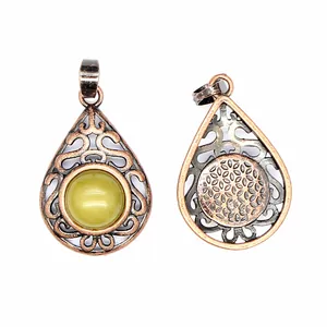 Antique copper hollow teardrop pendant with yellow natural stone, front and back view details
