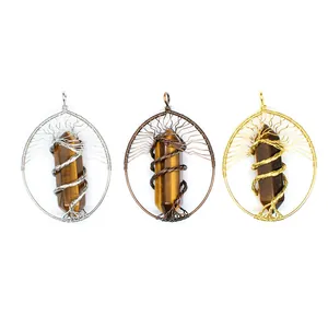 Detailed view of three Tree of Life wire wrapped tiger eye pendants in gold, silver, and bronze.