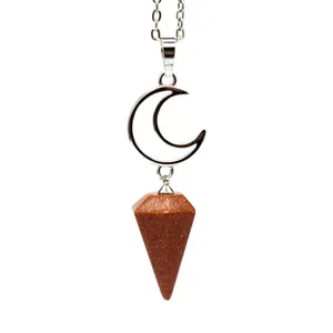 Close-up of crescent moon necklace with brown goldstone hexagonal cone pendant