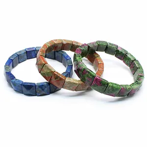 Detail view of three colorful natural stone square faceted beaded stretch bracelets