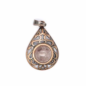 Detailed view of antique bronze hollow water-drop pendant featuring a pink natural stone