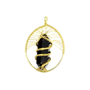 Detail view of handmade tree of life necklace with black hexagonal crystal pendant