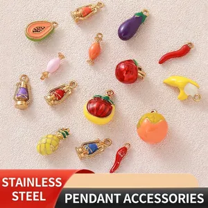 Close-up of 3D food-shaped enamel charms such as apple and chili for DIY jewelry