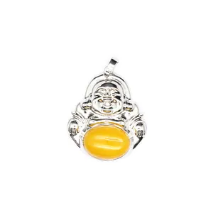 Detailed macro shot of a silver laughing Buddha pendant with an oval yellow natural stone.