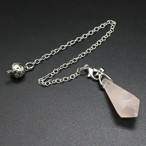 Detailed view of a hexagonal rose quartz crystal pendulum with ornate silver chain