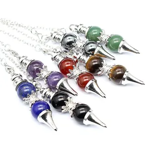 Detail view of various natural stone dowsing pendulums with 12mm beads and silver chains