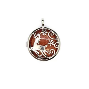 Close-up of reindeer pendant with sparkling brown goldstone and silver snowflake design