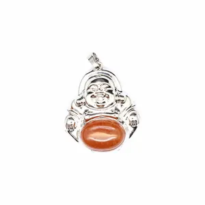Macro detail of silver Laughing Buddha pendant with polished orange natural stone