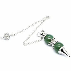 Natural green stone dowsing pendulum with ornate silver-toned metal chain and pointed tip