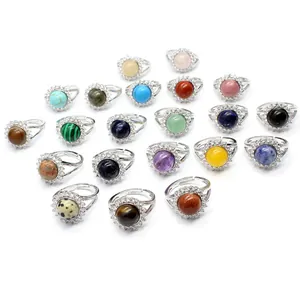 Collection of adjustable silver-tone rings featuring various colorful natural gemstones