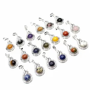 Collection of diverse natural gemstone pendants set in elegant silver-plated metal frames