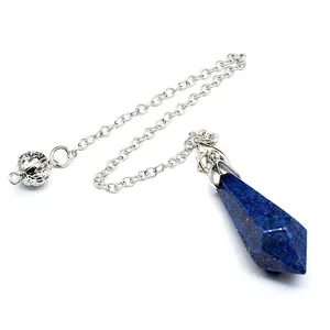 Detailed macro shot of a hexagonal lapis lazuli stone pendulum with a silver link chain