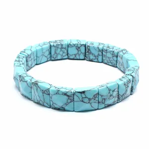 Detailed close-up of square turquoise stone beads featuring natural black marble veining