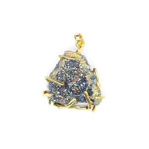 Detailed view of irregular triangular natural agate druzy pendant with gold wire wrapping
