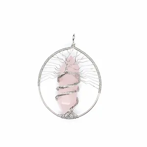 Detailed view of handmade silver wire-wrapped rose quartz Tree of Life pendant.