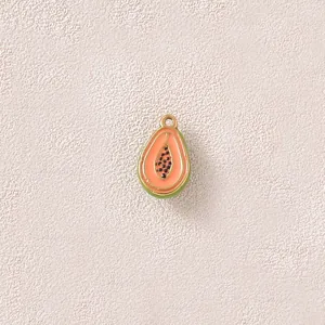 Detailed macro view of a 3D gold-plated papaya charm with colorful enamel inlay