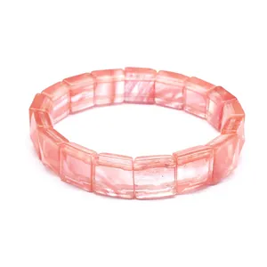 Macro view of a pink natural stone square faceted bracelet showing elegant translucent texture