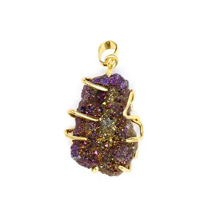 Close-up of purple iridescent natural agate druzy crystal pendant with gold plating