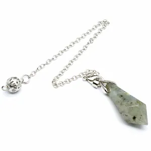 Close-up of hexagonal natural stone pendulum pendant with a polished silver chain