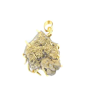 Close-up of a natural agate druzy crystal cluster pendant with electroplated gold finish