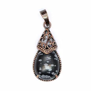 Vintage bronze teardrop pendant with natural snowflake obsidian stone detail