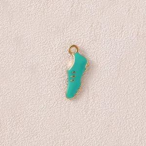 Detail of a teal enamel sneaker charm pendant for DIY jewelry making accessories.