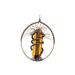 Detailed macro shot of wire-wrapped tiger eye crystal hexagonal pillar tree of life pendant.