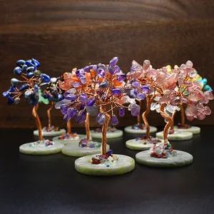 Group of handcrafted chakra crystal money trees with copper wire and stone bases
