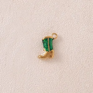 Close-up of a green and gold stainless steel western cowboy boot charm for DIY jewelry.