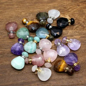 Close-up of assorted natural stone teardrop pendants used as essential oil diffusers