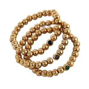 Stainless steel 8mm gold bead bracelets featuring colorful zircon birthstone charms