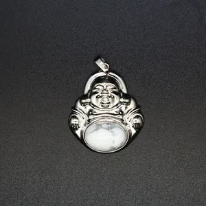 Close-up of a silver-tone Laughing Buddha pendant with white natural stone inlay.