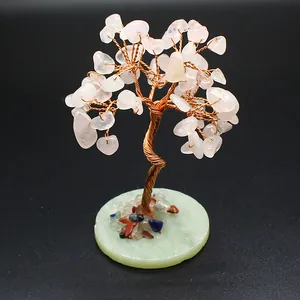Handmade rose quartz money tree with copper wire and colorful chakra stones on base