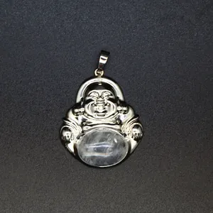 Close-up detail of a silver-toned laughing Buddha pendant with natural stone inlay.