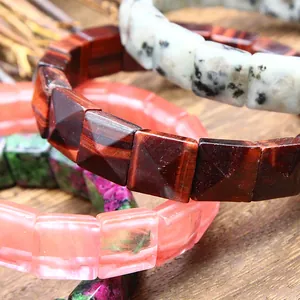 Close-up detail of multi-color faceted square natural stone stretch bead bracelets