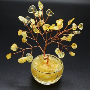 Handcrafted yellow crystal money tree of life ornament in a glass bowl for office decor