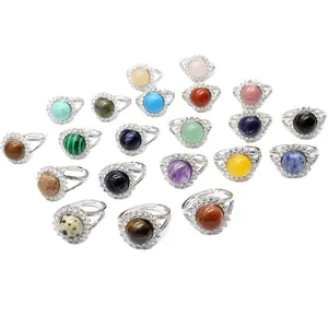 Adjustable silver-tone rings featuring a variety of natural semi-precious stone cabochons
