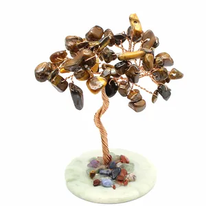 Handmade chakra crystal tree with tiger's eye stones and natural calcite slice base