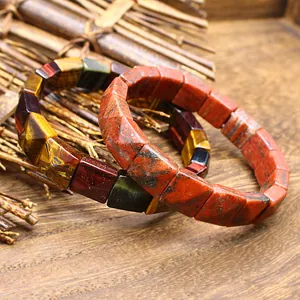 Macro view of faceted natural stone rectangle beads in tiger's eye and red jasper
