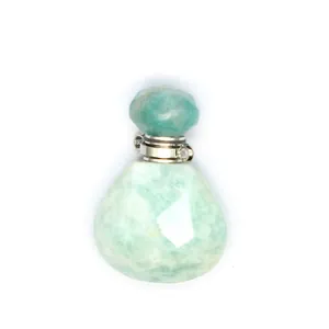 Detailed view of faceted natural stone teardrop perfume bottle pendant for essential oils