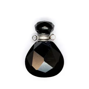 Macro view of a faceted black natural stone teardrop essential oil diffuser bottle pendant