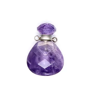 Detailed close-up view of a faceted purple amethyst crystal perfume bottle pendant diffuser