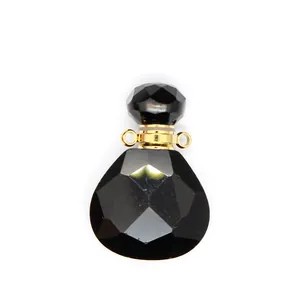 Detail view of black faceted natural stone essential oil diffuser bottle pendant